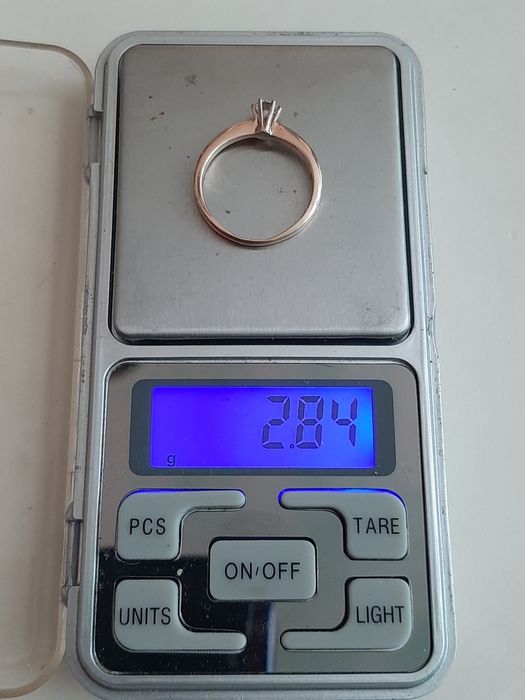 Золотое кольцо с бриллиантом 0.31 карат.