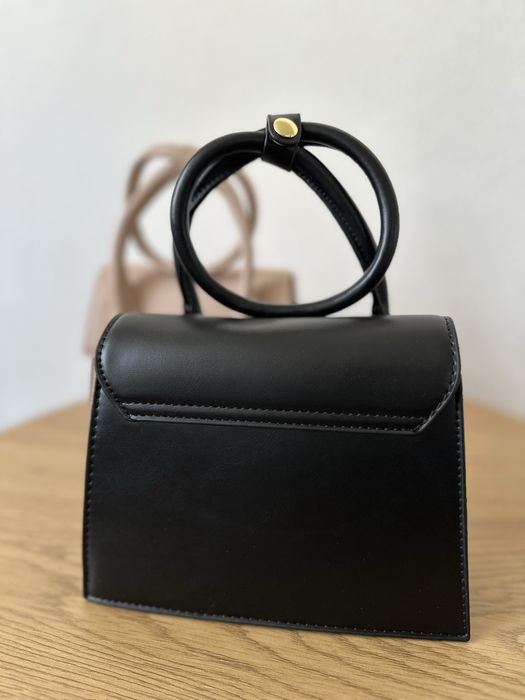 Стильні сумочки в бежевому, чорному та рожевому кольорах