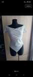 Efektowne body łamana biel