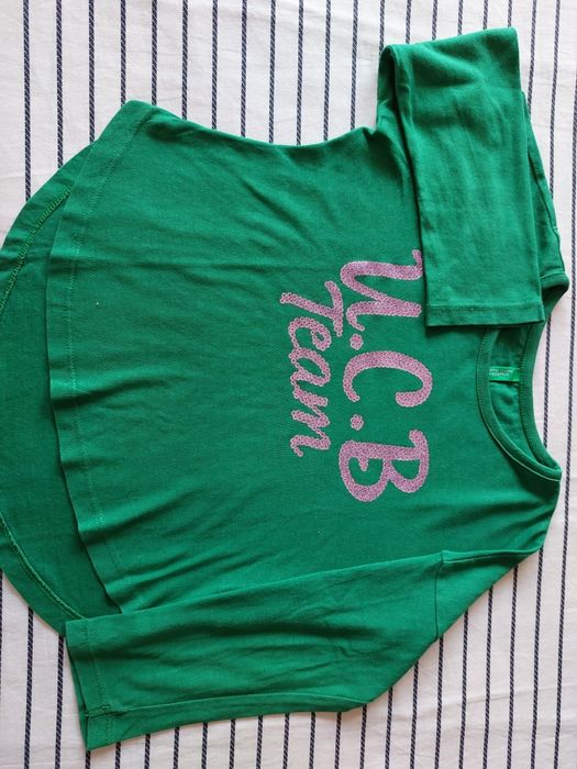 Blusa menina com estampado. Marca Benetton. Tamanho 2 anos.