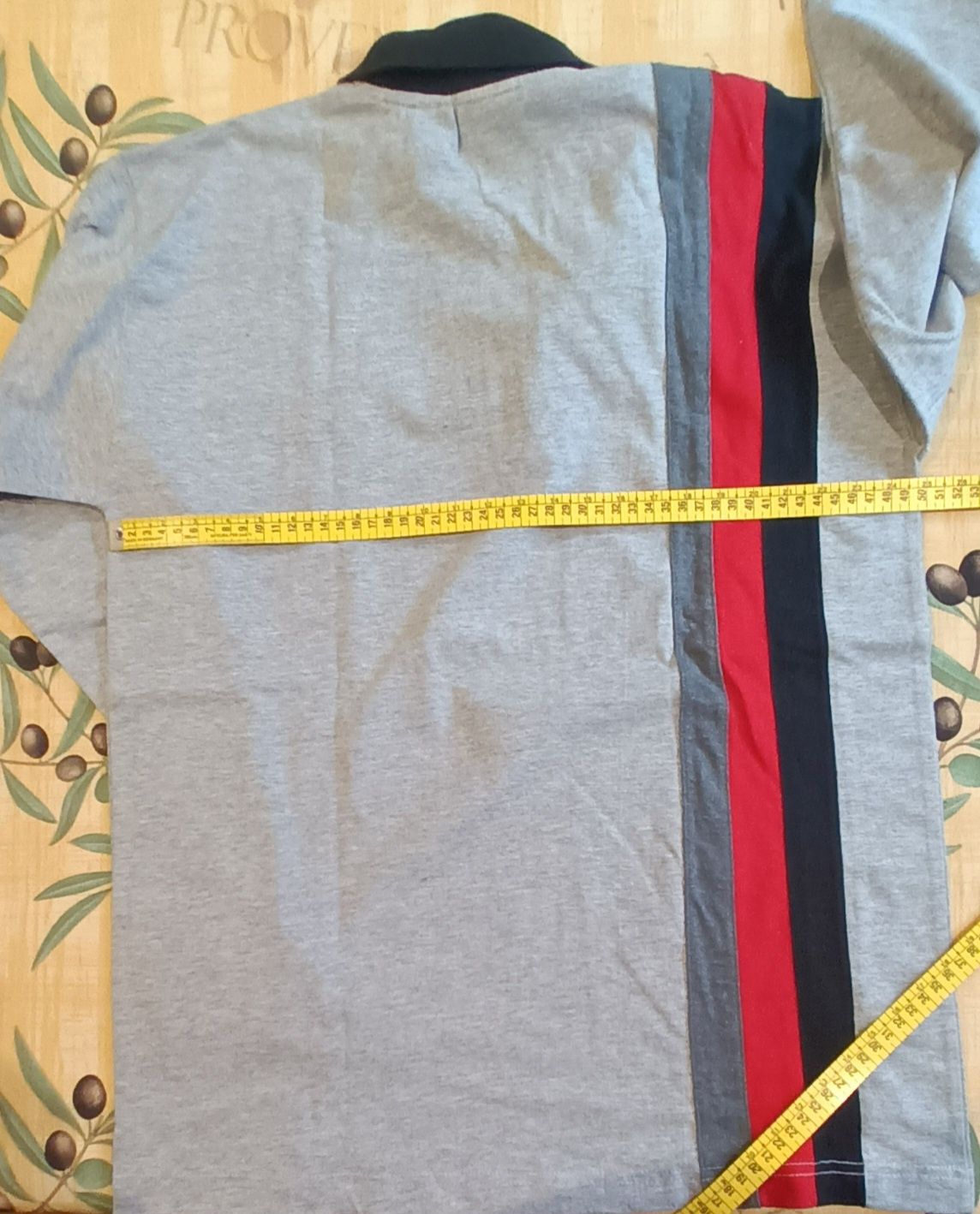 Polo de manga comprida e fecho