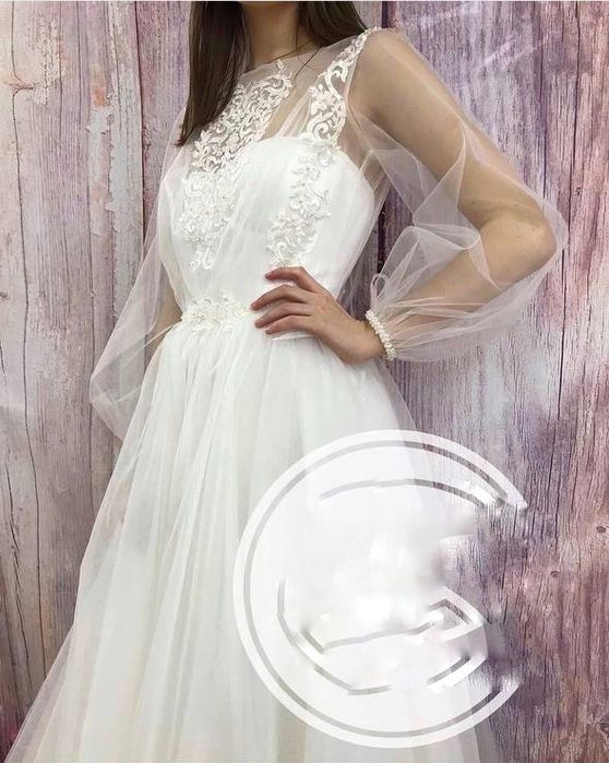 Весільне плаття з накидкою