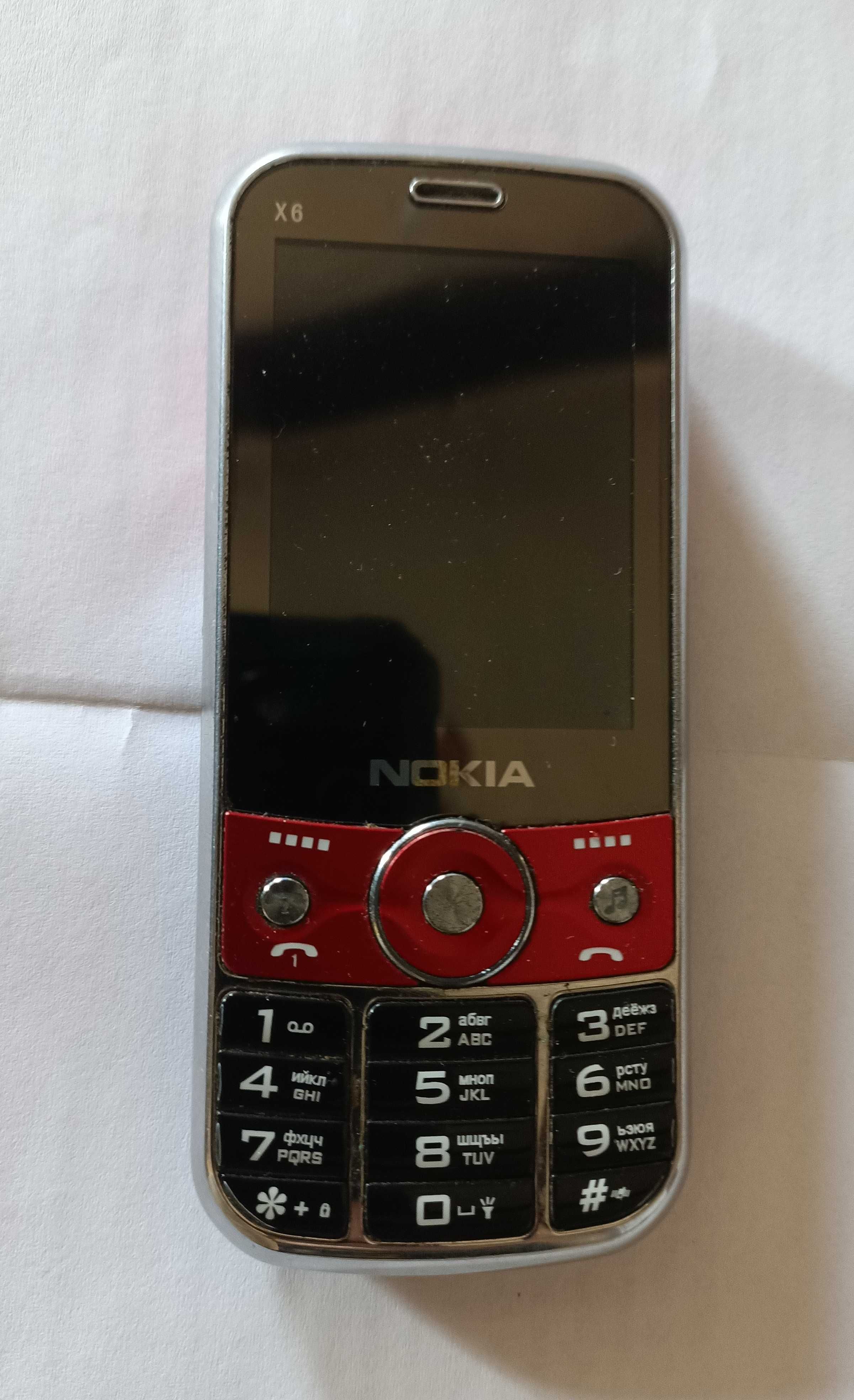 Продам мобильный телефон Nokia APPO X6 .