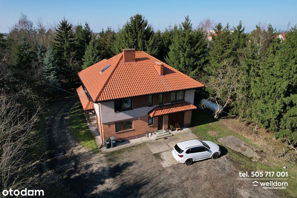 Dom z dużą działką 5430 m2 i garażami. Dla biznesu