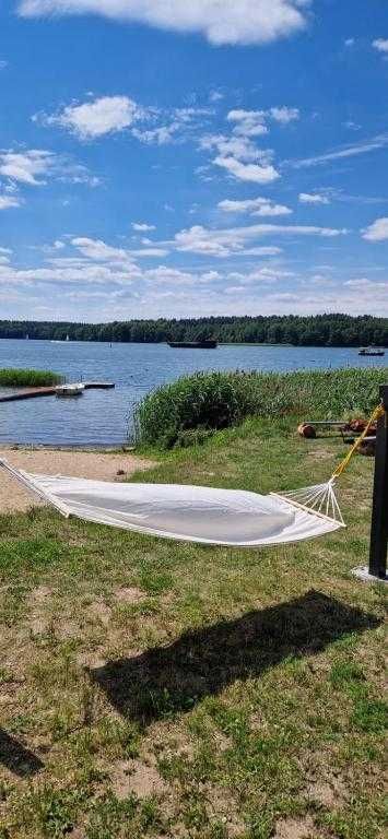 Domek Mikołajki z własną plażą, pomost, łódka Szary domek Mikołajki