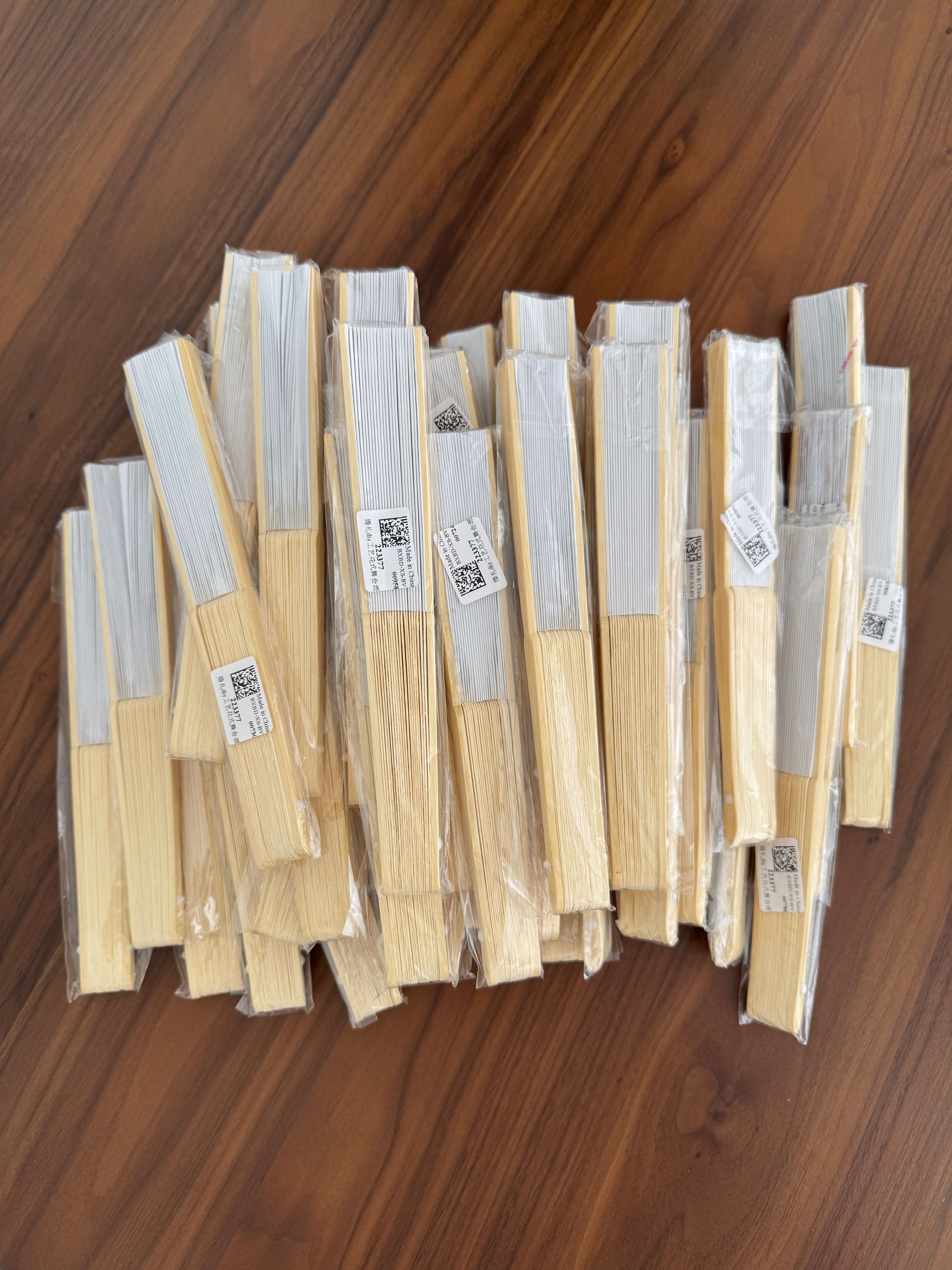 50 leques de papel