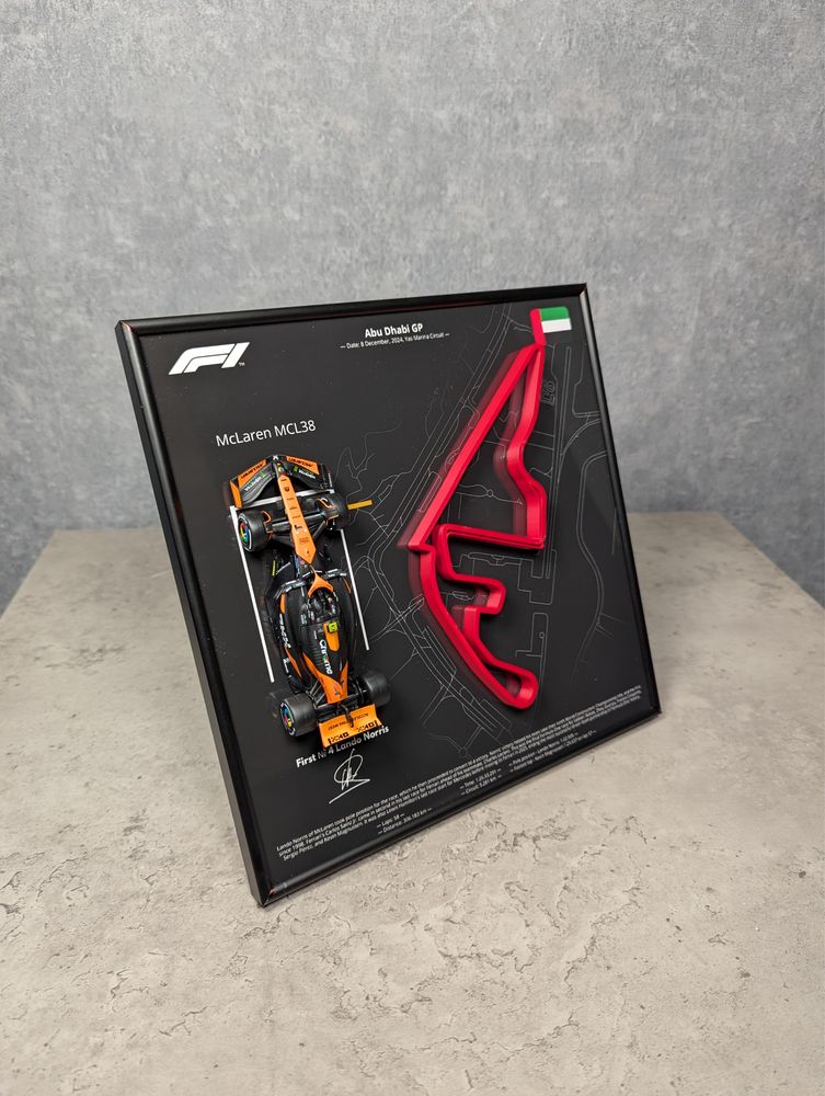 Bburago 2в1 F1 McLaren MCL38 Траса Abu Dhabi GP 2024 #4 Lando Norris