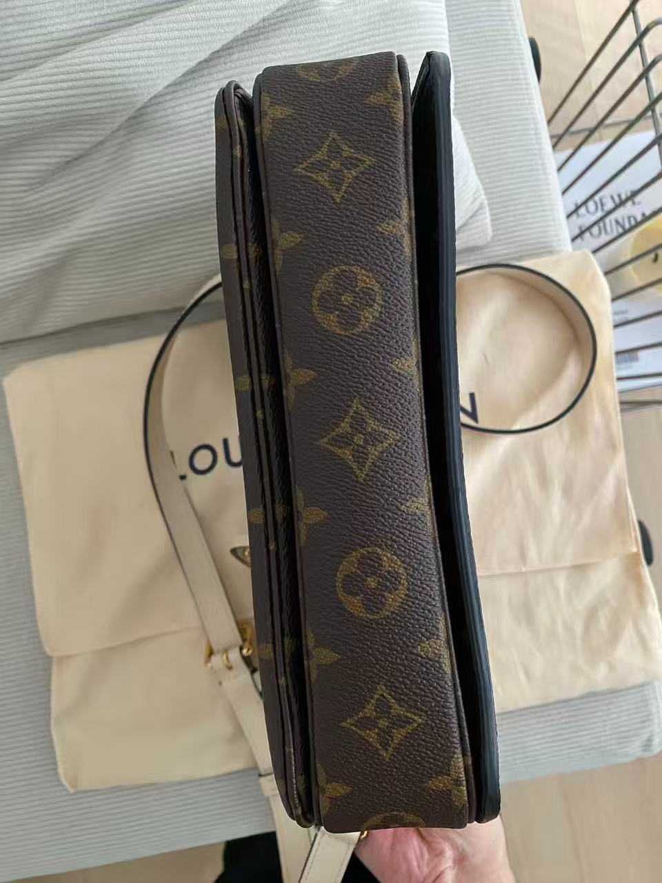 "Bolsa Mensageira LOUIS VUITTON Pochette Métis."