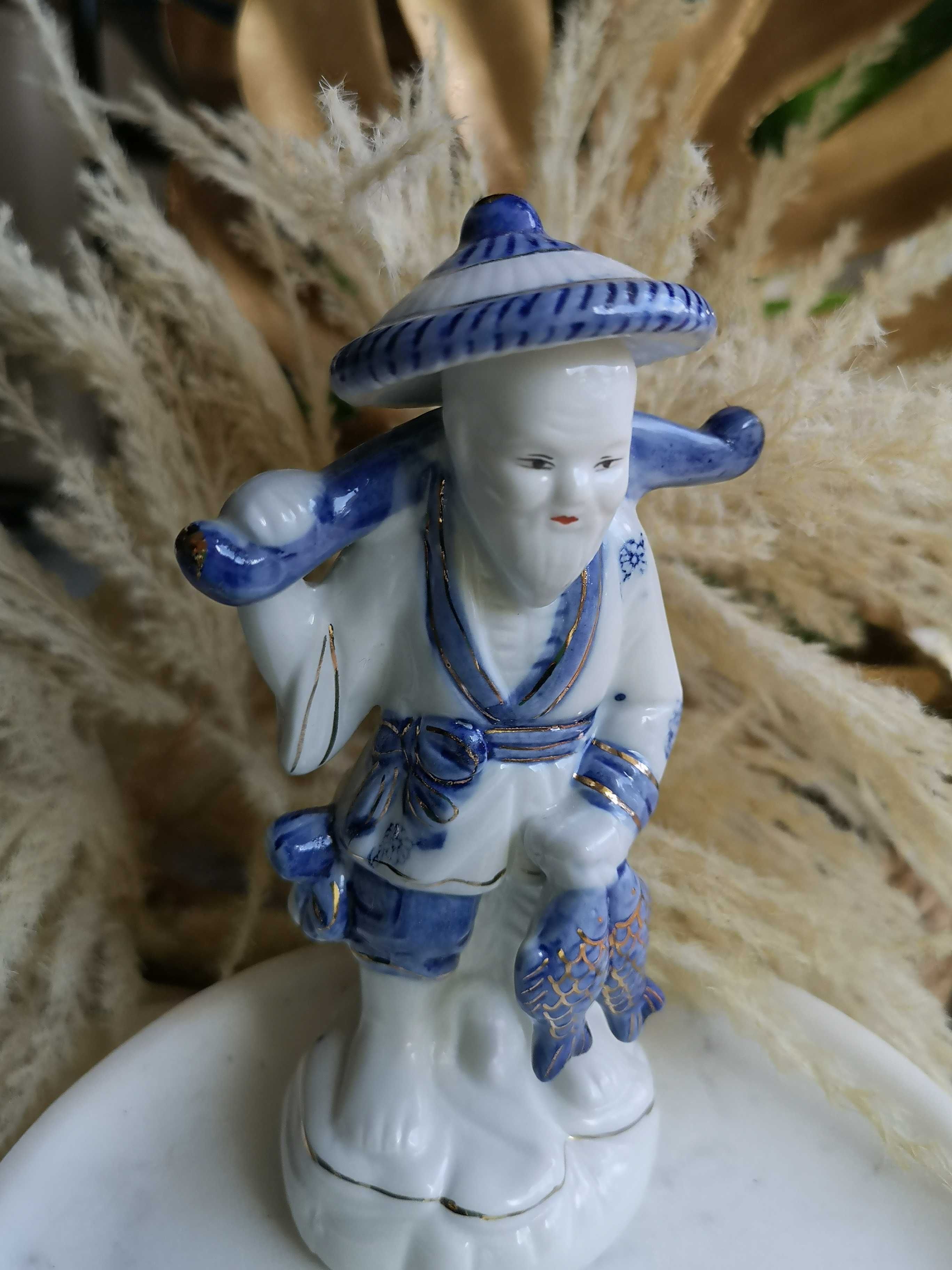 figurka porcelanowa rybak