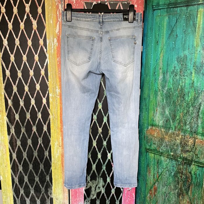 Spodnie jeansowe z dziurami Pieszak [27]