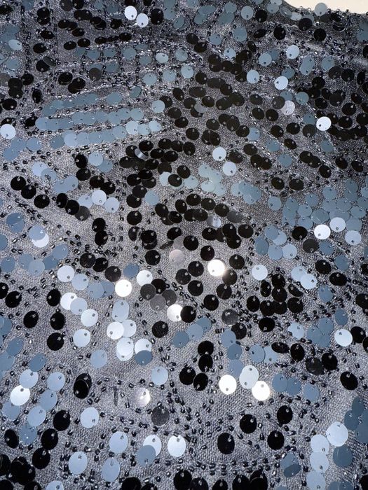 Спідниця міні в паєтку нова