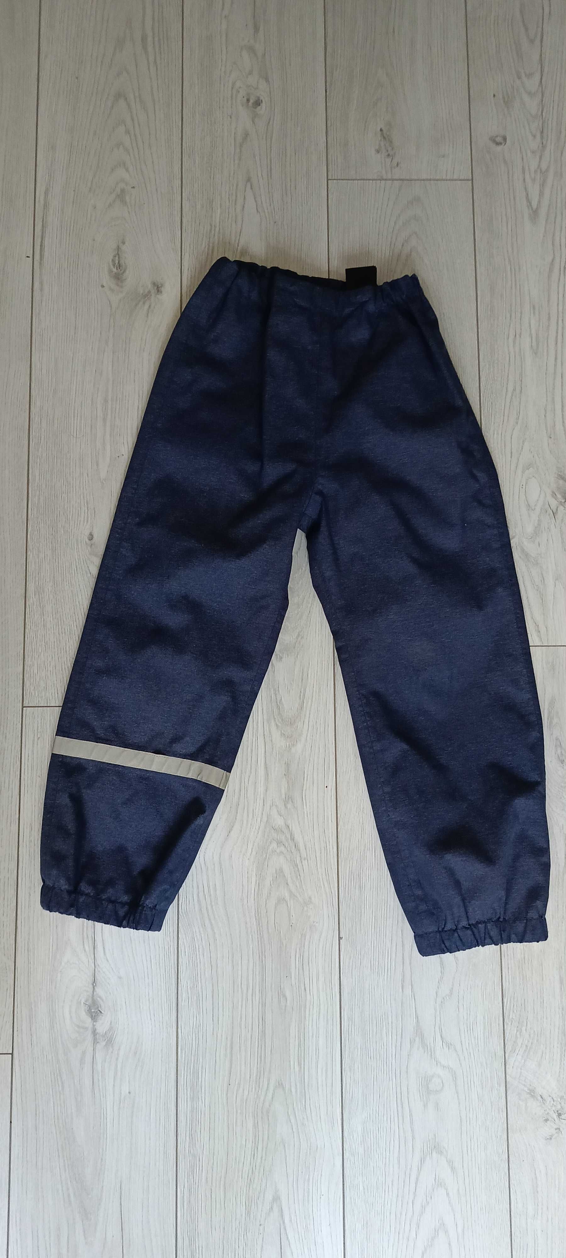 h&m SPORT spodnie chronią przed wiatrem i deszczem, odblaski r. 116