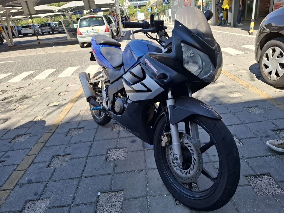 Honda 125 cbr troco por carro
