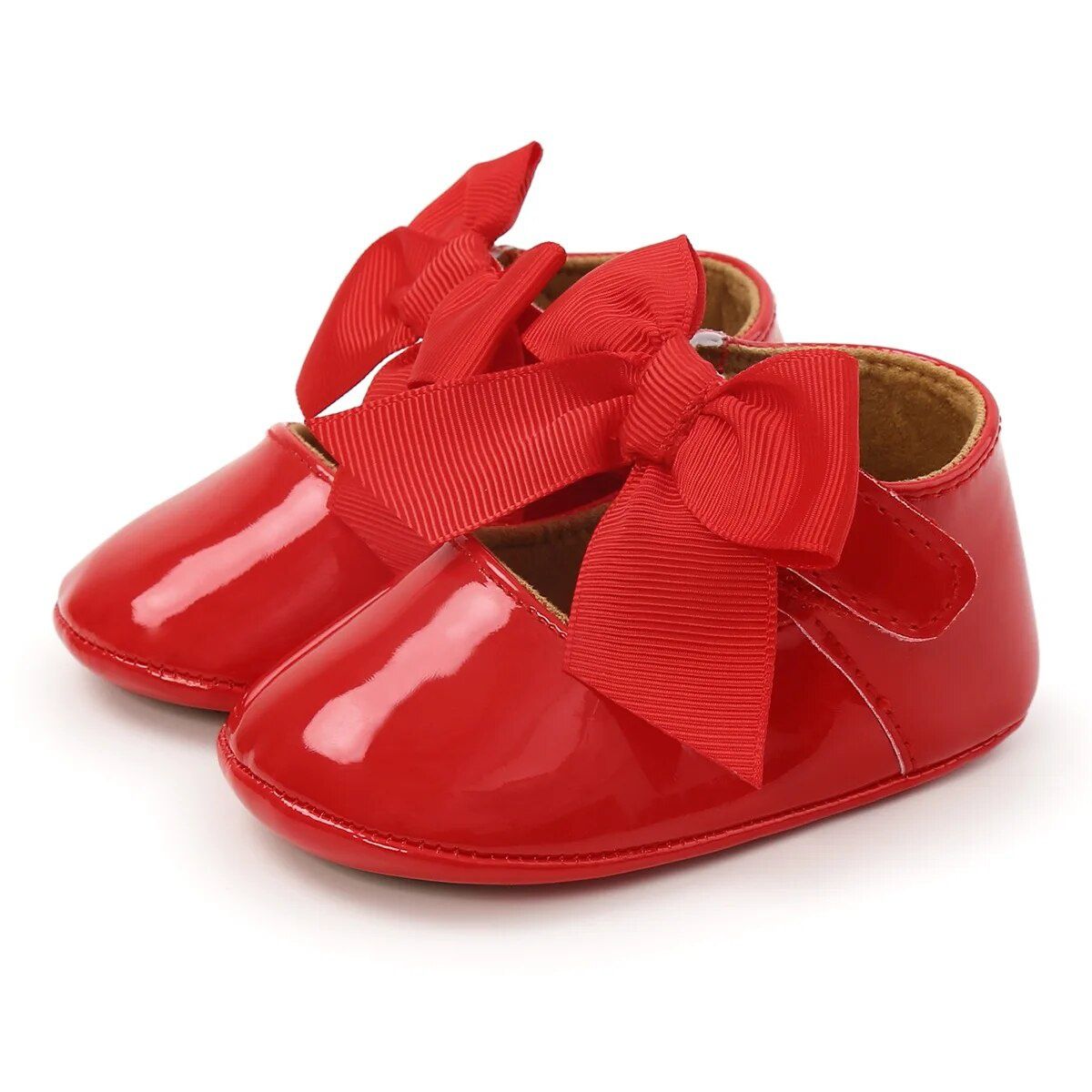 Czerwone buciki z kokardą niemowlęce niechodki 0-6 miesięcy 10,5 cm