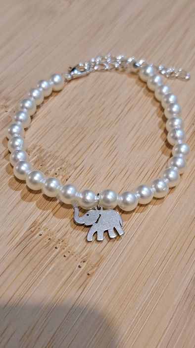 Komplet naszyjnik i bransoletka z pereł na szczęście ze słoniem