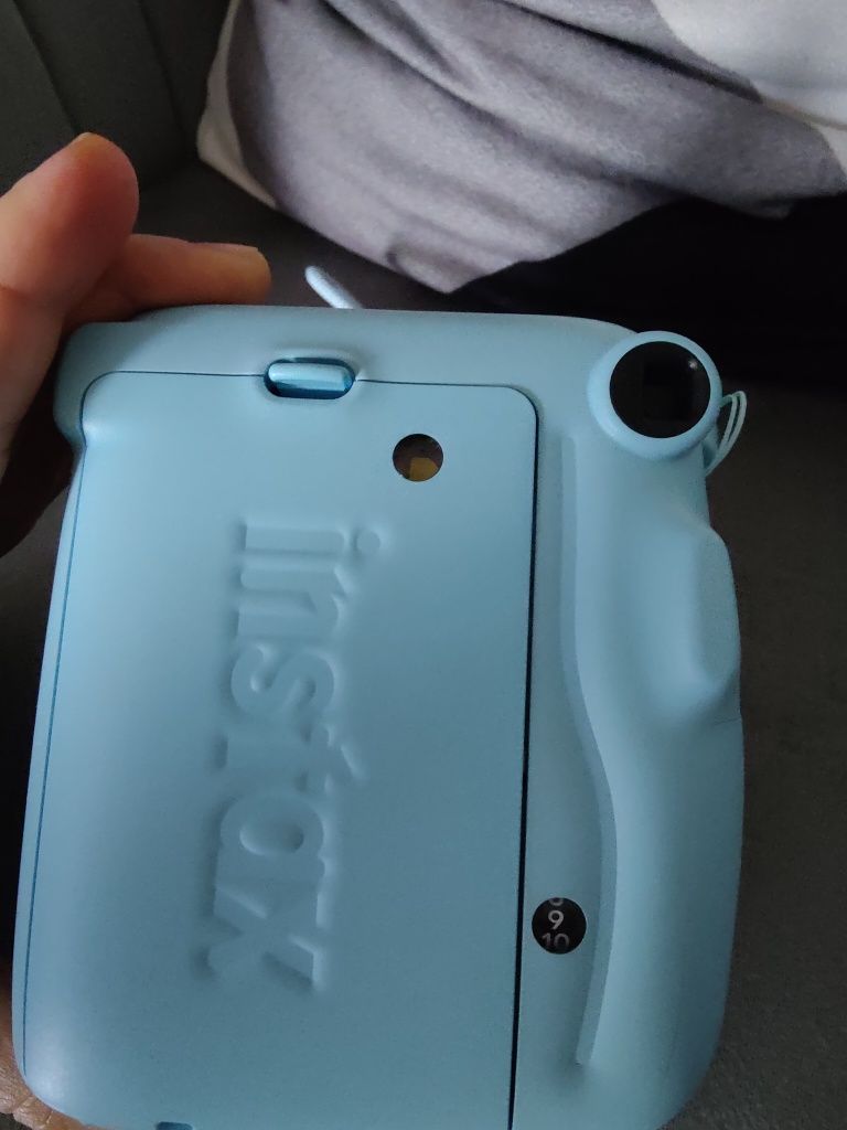 Máquina fotográfica instax