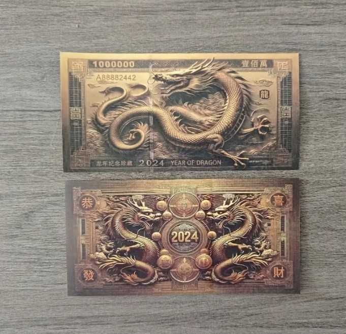 Kolekcjonerski zestaw banknotów?? przedstawiających chińskie smoki