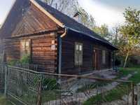 Sprzedam działkę z domem drewnianym w Suchorzowie