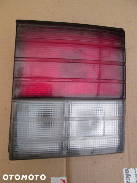LAMPA TYLNA DAEWOO SSANGYONG MUSSO PRAWA KLAPA