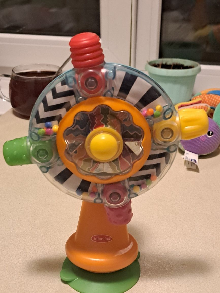 Розвивальна іграшка Infantino Вертушка сонечко