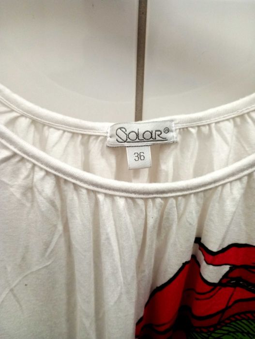 Śliczna biała bluzka, dzianina, aplikacja latawce. Solar