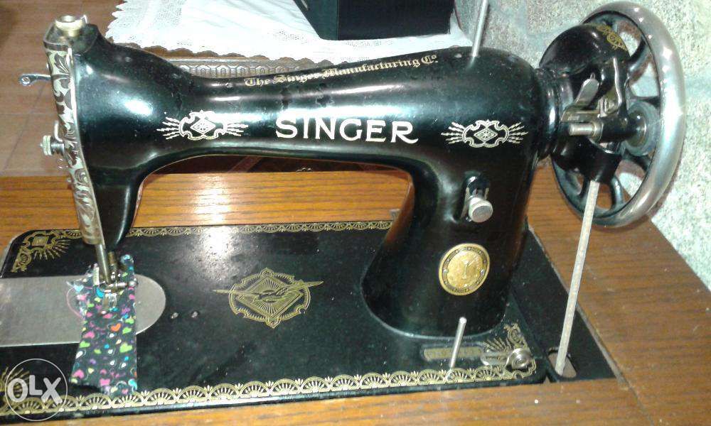 Máquina de costura singer