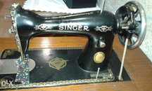 Máquina de costura singer