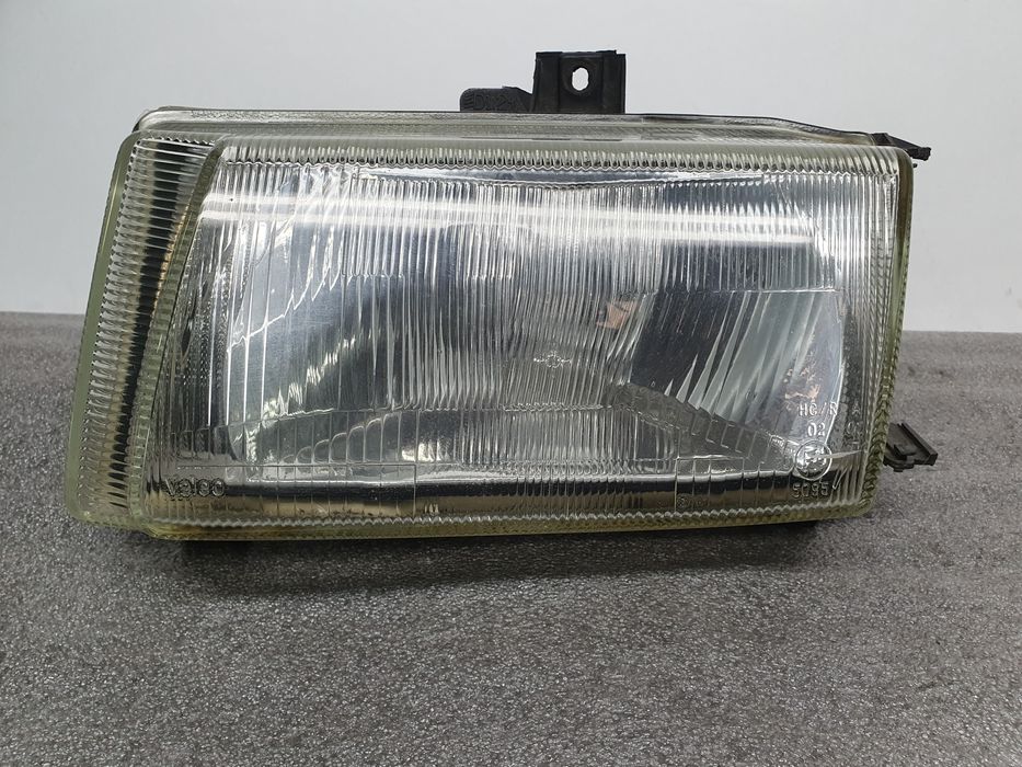 Ótica / farol esquerda VOLKSWAGEN Polo Variant (6V5)