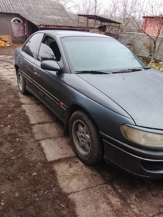 Опель Омега б 2.0