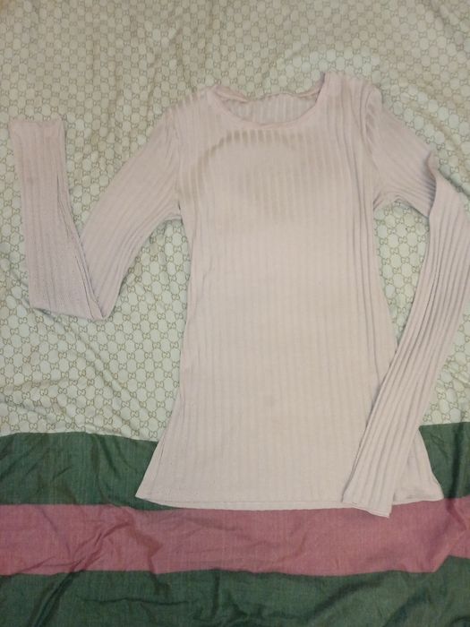 ніжно рожевий гольф