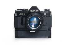 Canon AE-1 Black + 2 lentes + autowinder- Câmara fotográfica analógica