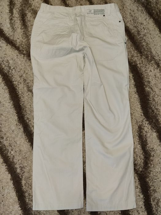 Letnie spodnie męskie jasne beżowe Ravel 32/30 M