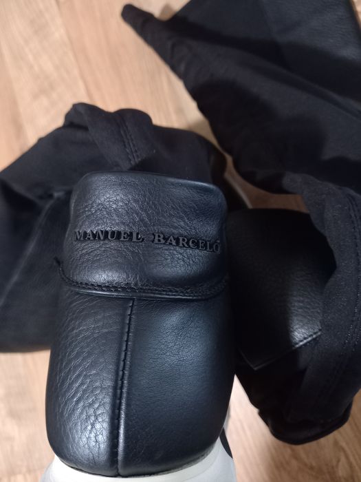 Шкіряні ботфорди