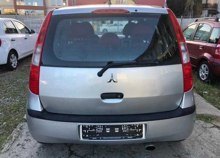 Разборка Mitsubishi Colt запчасти Кольт робот