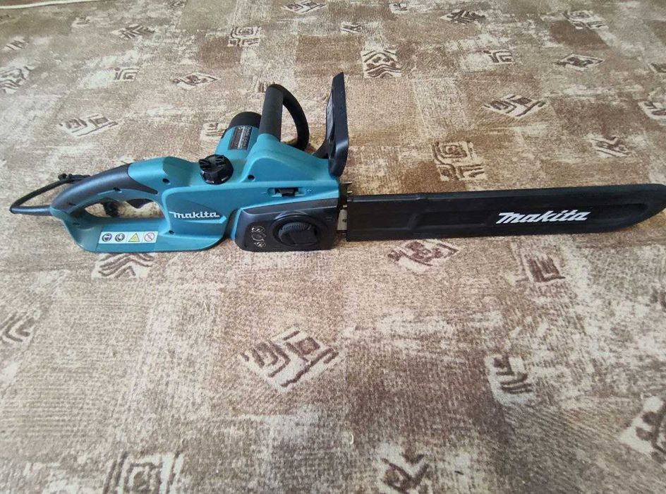 Електропила Makita UC4041A
