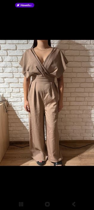 Eleganckie beżowy kombinezon rozm.42