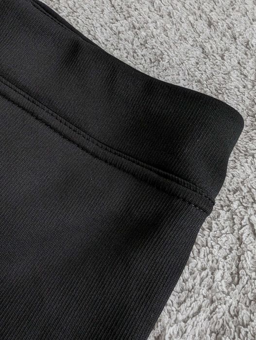 Czarne ocieplane futerkiem spodnie legginsy 128 - 134 - 140 jak nowe