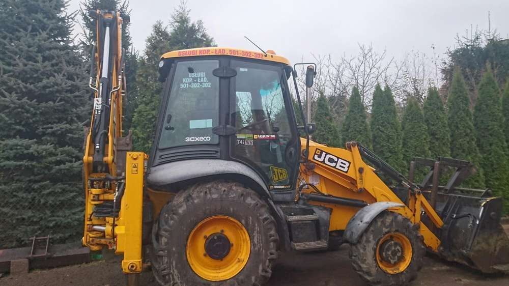 Usługi koparko ładowarką koparka ładowarka koparką Wykopy prace ziemne