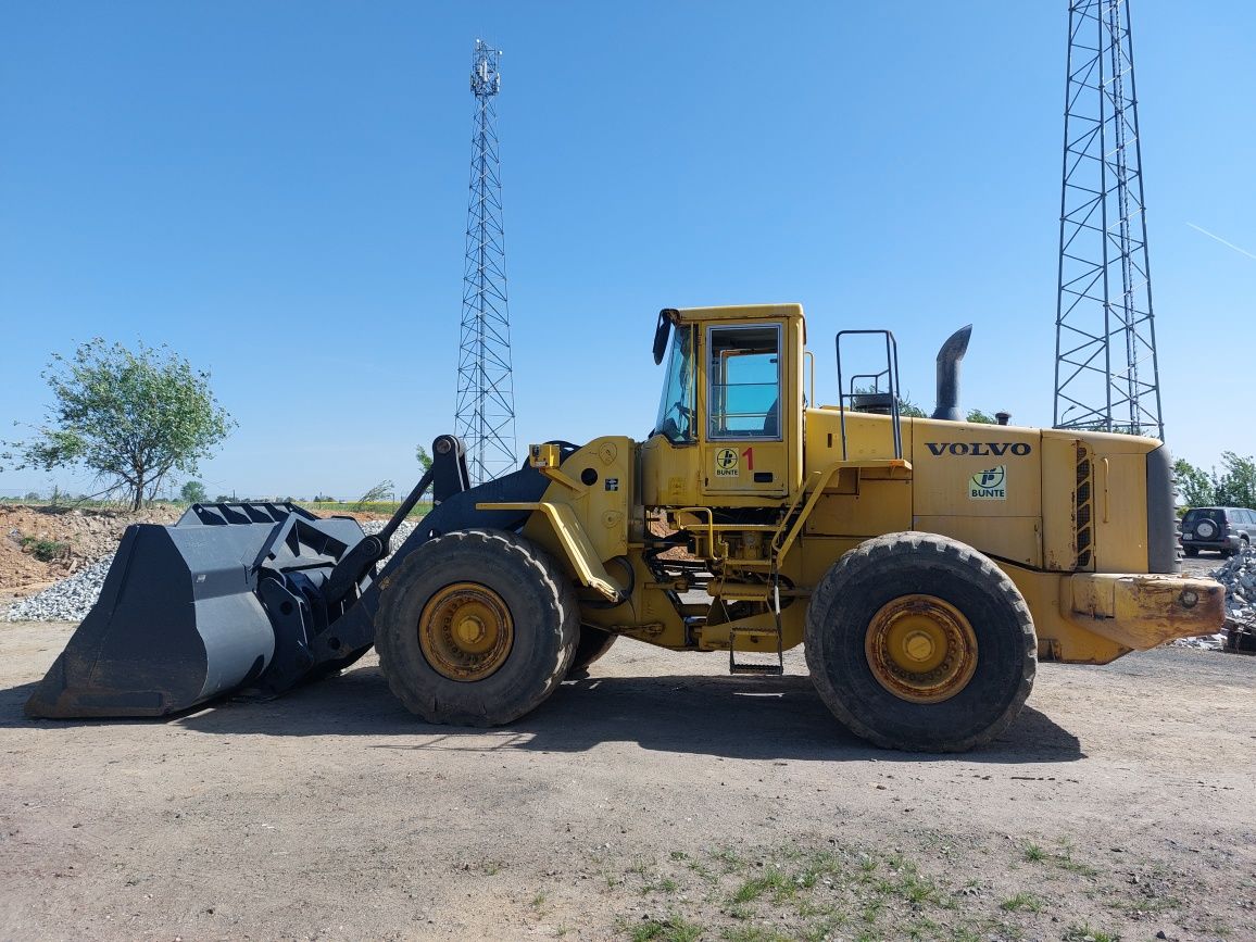 Ładowarka Volvo L 180E szybkozłącze łyżka widły z 2005 roku, stan dobr