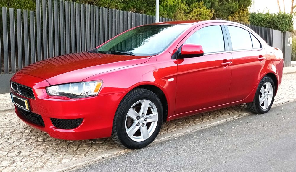Mitsubishi Lancer 1.5 gasolina, 2009, só 121.800 Km. Excelente.