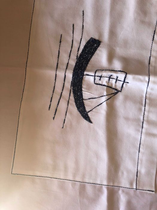 Avental com bolso grande bordado