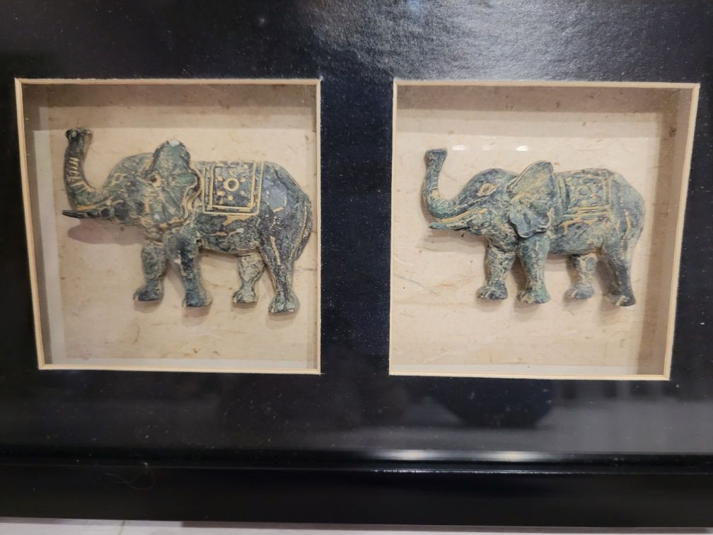 Obrazek 3D figurki słoni w boxie