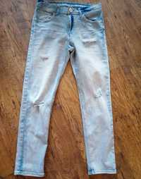 H&M jeansy dżinsy spodnie przetarcia dziury 152