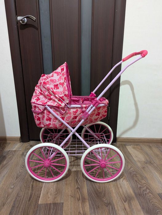 Коляска для кукол з куклой