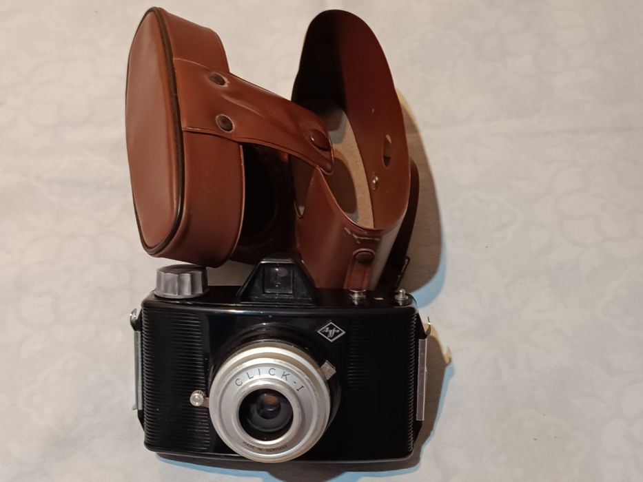 2 Duas Máquinas de fotografar e uma máquina de filmar