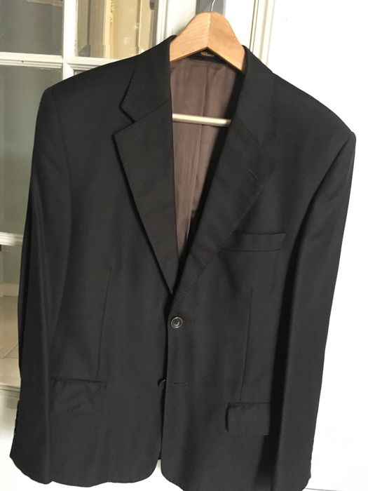 Casaco preto da Marca Milano do tamanho M/L em bom estado