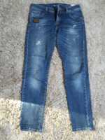 Dżinsy niebieskie z przetarciami Facchino Jeans