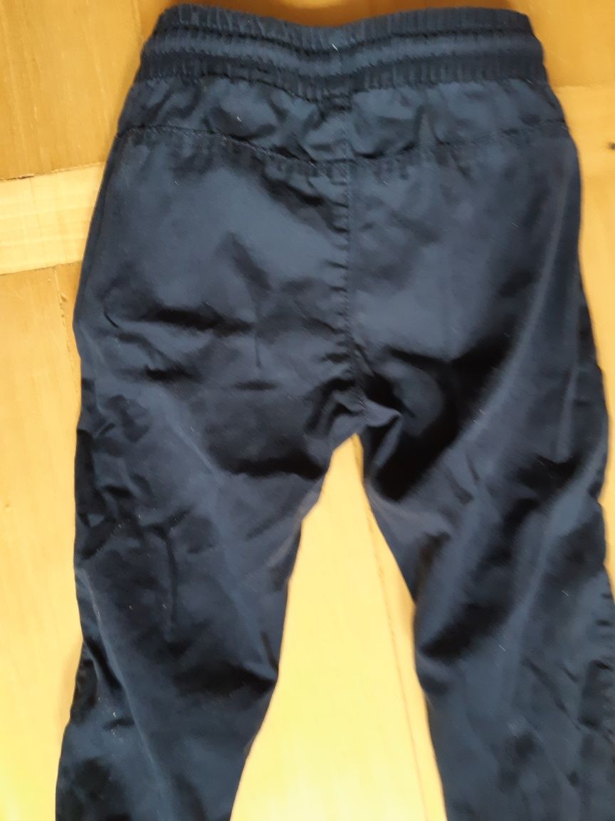 dwie pary spodni H&M ciepłe jodełkowe i granatowe, r. 86 92