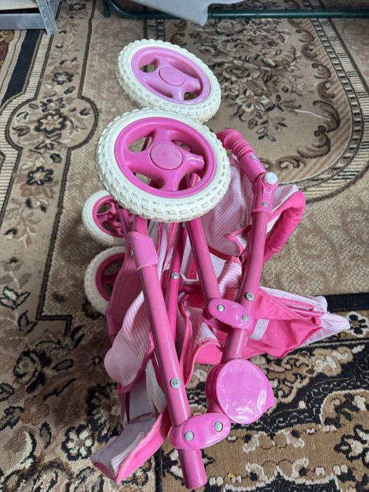 Дитяча коляска іграшкова