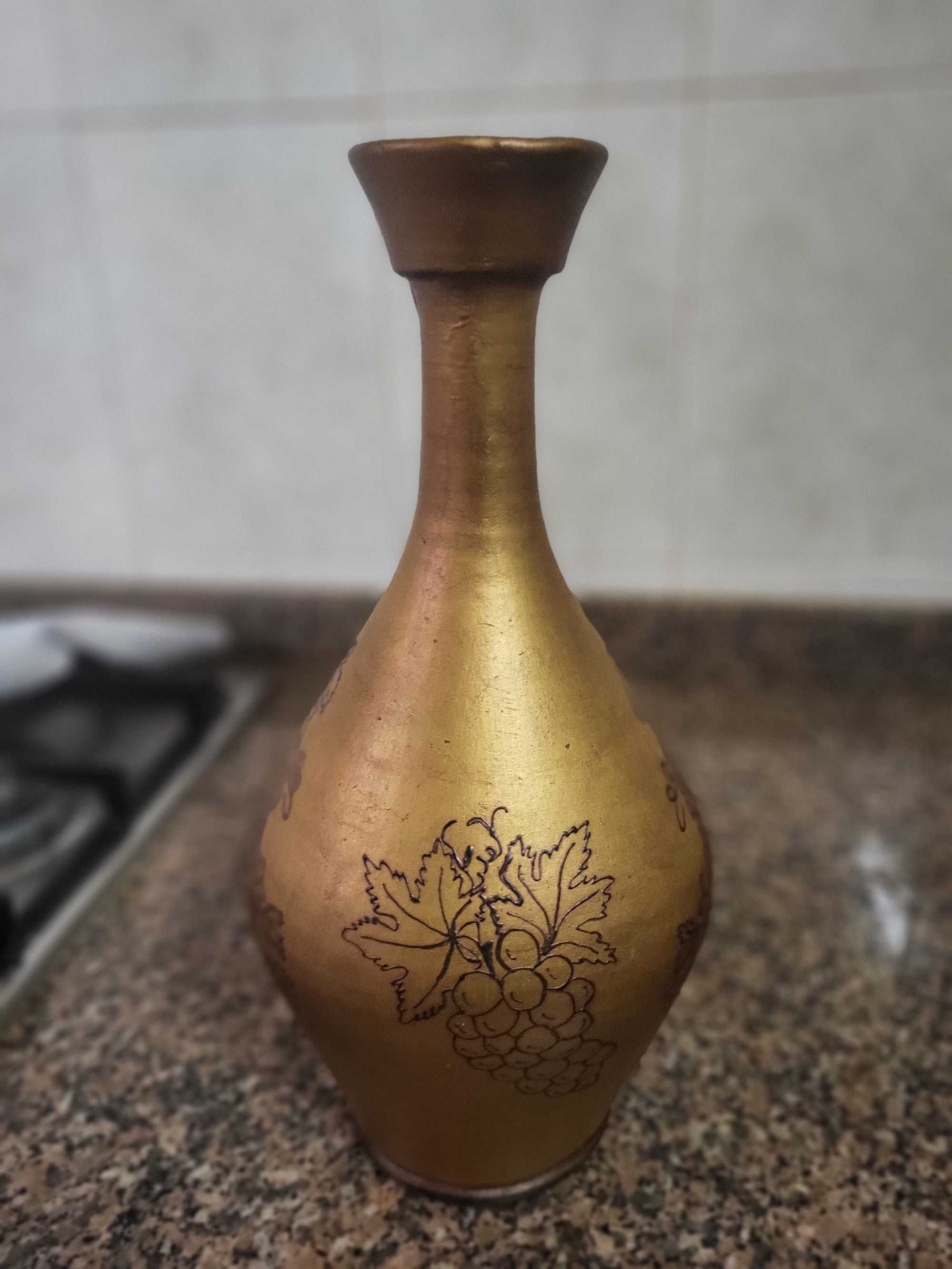 Jarro em ceramica dourado